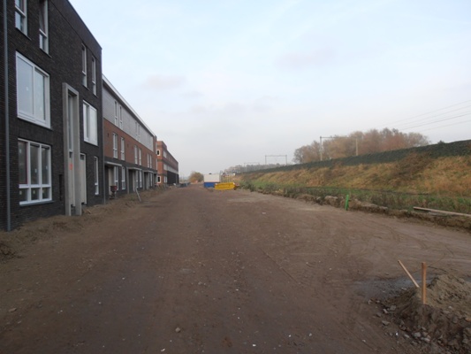 Polluxstraat - De contouren van de straat en de parkeervakken zijn inmiddels goed zichtbaar. (19 november 2011)