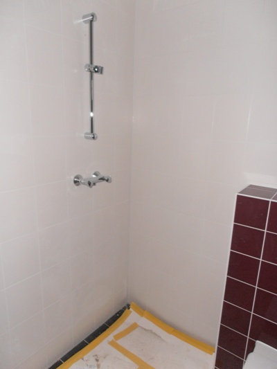 Gratema - Badkamer. De douchestang