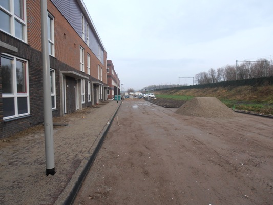 Polluxstraat - De stoep ligt er. De straat zelf zal spoedig volgen. (12 december 2011)
